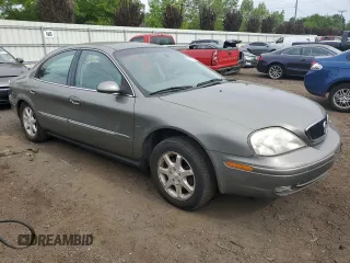 2002 Mercury Sable LS z VIN 1MEHM55S22G652254, wystawiony jako Copart lot #58667475 z przebiegiem 68 050 mil mil oraz Czysty tytuł • Clean title. Historia ofert i sprzedaży dostępna na DreamBid. Obrazek 4.