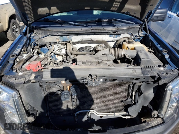 2012 Ford F-150 XL with VIN 1FTNF1CF5CKD98700, listed as a Copart auction lot 43165675 with 65,089 mi miles and Salvage title. Bid and sale history available at DreamBid. Image 11.