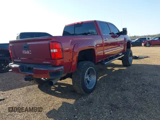 2018 GMC Sierra 2500HD Denali z VIN 1GT12UEY6JF272619, wystawiony jako IAAI lot #41743216 z przebiegiem 165 231 mil mil oraz . Historia ofert i sprzedaży dostępna na DreamBid. Obrazek 4.