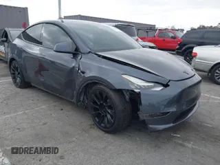 2023 Tesla Model Y Performance with VIN 7SAYGDEFXPF785838, listed as a IAAI auction lot 42031518 with 12,335 mi miles and . Bid and sale history available at DreamBid. Image 1.