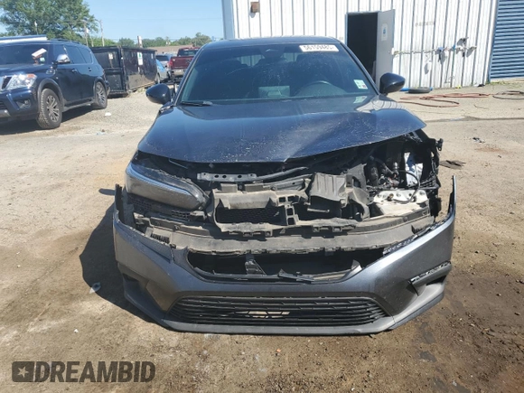 2022 Honda Civic Sport z VIN 2HGFE2F53NH589284, wystawiony jako Copart lot #56159485 z przebiegiem 126 636 mil mil oraz Szkoda całkowita • Salvage title. Historia ofert i sprzedaży dostępna na DreamBid. Obrazek 5.