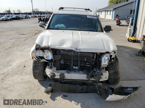 2009 Jeep Grand Cherokee Laredo with VIN 1J8HR48P89C532571, listed as a Copart auction lot 57309544 with 203,423 mi miles and Non Repairable. Bid and sale history available at carsss.com. Image 5.
