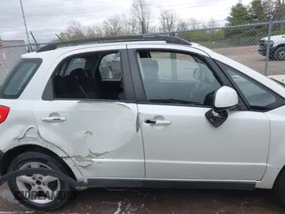 2007 Suzuki SX4 with VIN JS2YB413375110637, listed as a IAAI auction lot 42023013 with 226,585 mi miles. Bid and sale history available at carsss.com. Image 14.
