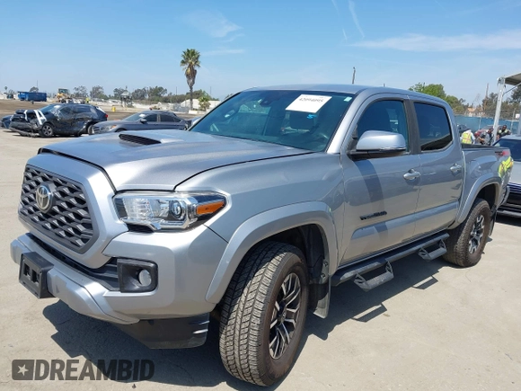 2021 Toyota Tacoma SR with VIN 3TMCZ5AN6MM393306, listed as a IAAI auction lot 42094095 with 57,217 mi miles and . Bid and sale history available at DreamBid. Image 18.