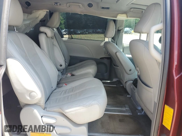 2012 Toyota Sienna XLE AAS z VIN 5TDYK3DC9CS243892, wystawiony jako Copart lot #61198555 z przebiegiem 129 061 mil mil oraz Nie do naprawy • Non repairable. Historia ofert i sprzedaży dostępna na DreamBid. Obrazek 11.