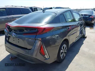 2018 Toyota Prius Plus with VIN JTDKARFP0J3101473, listed as a IAAI auction lot 41857956 with 110,020 mi miles and . Bid and sale history available at DreamBid. Image 4.