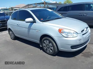 2010 Hyundai Accent GS z VIN KMHCM3AC1AU172331, wystawiony jako IAAI lot #42197375 z przebiegiem 159 282 mil mil oraz . Historia ofert i sprzedaży dostępna na DreamBid. Obrazek 1.
