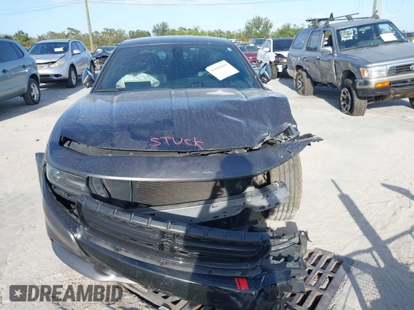 2015 Dodge Charger RT with VIN 2C3CDXCT9FH819971, listed as a IAAI auction lot 40592010 with 154,386 mi miles and . Bid and sale history available at DreamBid. Image 13.