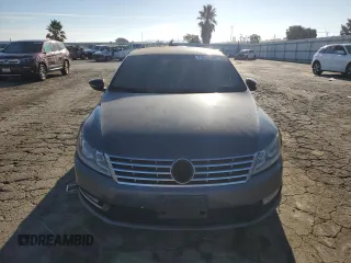 2013 Volkswagen CC Sport with VIN WVWBP7ANXDE525051, listed as a Copart auction lot 70659744 with 293,611 mi miles and Salvage Title. Bid and sale history available at DreamBid. Image 5.