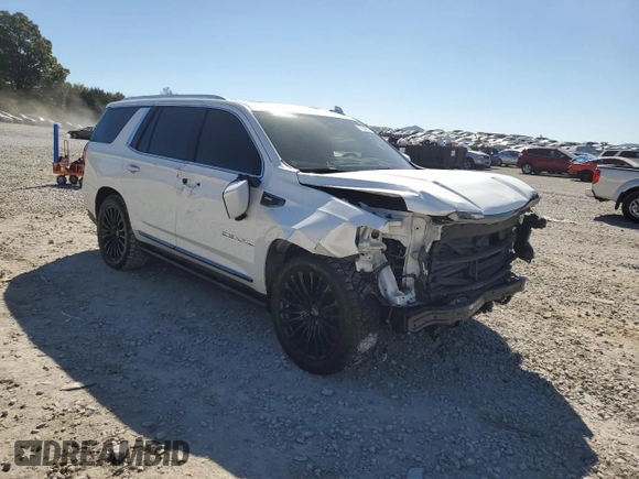 2023 GMC Yukon Denali Ultimate with VIN 1GKS2EKL0PR132029, listed as a Copart auction lot 77234034 with 58,071 mi miles and Salvage Title. Bid and sale history available at carsss.com. Image 4.