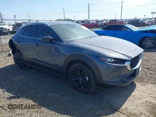 2022 Mazda CX-30 S Carbon Edition с VIN 3MVDMBCL8NM422737, выставлен на аукционе IAAI как лот 42229336 с пробегом 14 665 миль миль и . История ставок и продаж доступна на DreamBid. Изображение 1.
