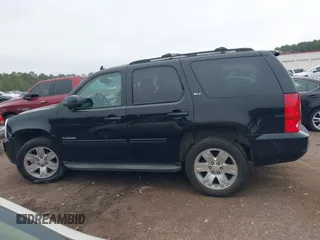 2012 GMC Yukon SLT with VIN 1GKS1CE09CR141878, listed as a IAAI auction lot 41552512 with 204,253 mi miles. Bid and sale history available at carsss.com. Image 14.
