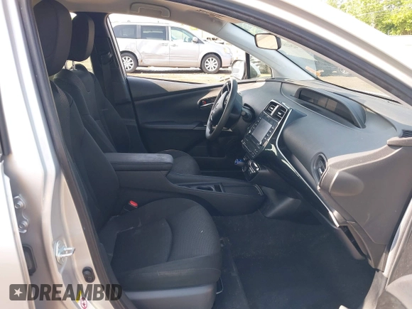 2022 Toyota Prius L Eco z VIN JTDKAMFU2N3165805, wystawiony jako IAAI lot #42428676 z przebiegiem 435 471 mil mil oraz . Historia ofert i sprzedaży dostępna na DreamBid. Obrazek 5.