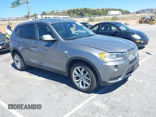 2013 BMW X3 xDrive28i with VIN 5UXWX9C58D0A31571, listed as a IAAI auction lot 41872088 with 126,945 mi miles. Bid and sale history available at carsss.com. Image 1.