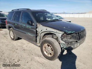 2002 Jeep Grand Cherokee Laredo with VIN 1J4GW48S52C169047, listed as a Copart auction lot 88548745 with 160,258 mi miles and Salvage Title. Bid and sale history available at carsss.com. Image 4.