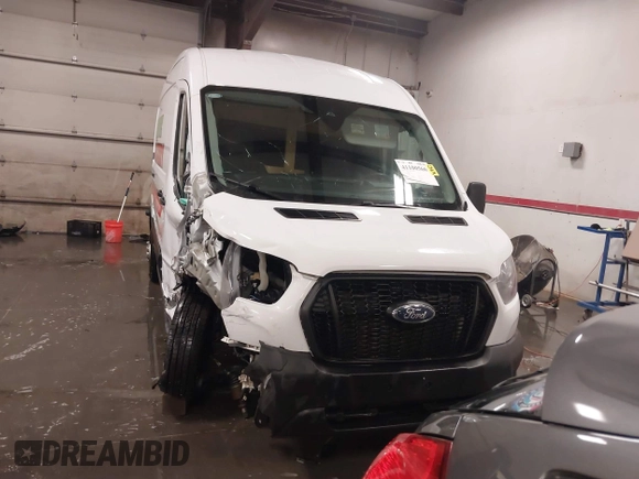 2024 Ford Transit Cargo with VIN 1FTBR2C81RKA01686, listed as a IAAI auction lot 41100566 with 74,842 mi miles and . Bid and sale history available at DreamBid. Image 12.
