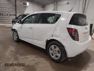 2014 Chevrolet Sonic LS with VIN 1G1JA6SG4E4208132, listed as a IAAI auction lot 38646142 with 154,013 mi miles and . Bid and sale history available at DreamBid. Image 3.