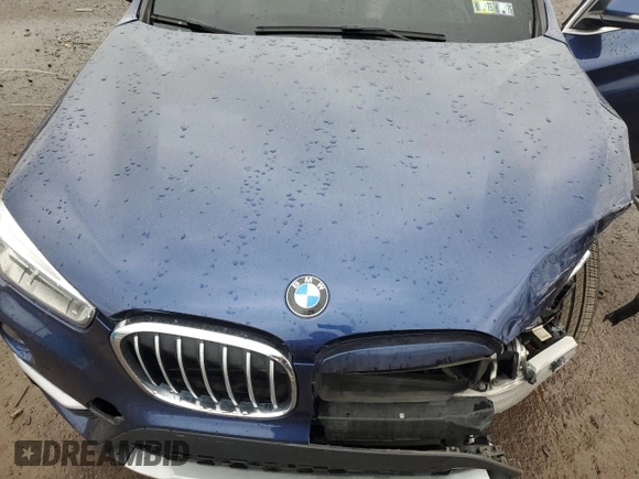 2017 BMW X1 xDrive28i with VIN WBXHT3C3XH5F69573, listed as a Copart auction lot 52719715 with 93,981 mi miles and Salvage Title. Bid and sale history available at DreamBid. Image 12.