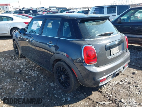 2015 MINI Hardtop 4 Door S with VIN WMWXU3C52F2B56517, listed as a IAAI auction lot 41437491 with 111,916 mi miles and . Bid and sale history available at DreamBid. Image 3.