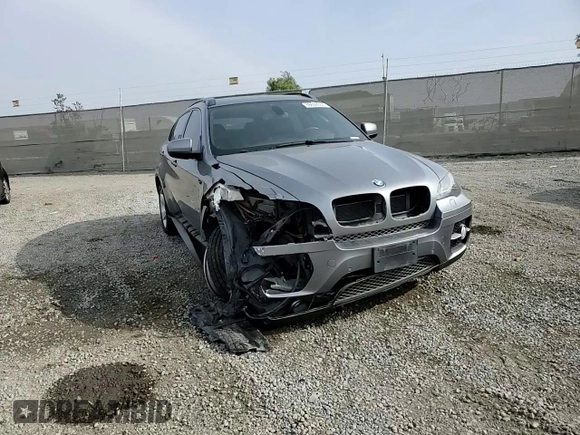 2012 BMW X6 50i z VIN 5UXFG8C53CL590367, wystawiony jako Copart lot #86650664 z przebiegiem Nie podano mil oraz Szkoda całkowita • Salvage title. Historia ofert i sprzedaży dostępna na DreamBid. Obrazek 11.