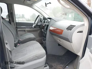 2008 Chrysler Town & Country LX with VIN 2A8HR44H28R114978, listed as a IAAI auction lot 41860775 with 179,828 mi miles. Bid and sale history available at carsss.com. Image 5.