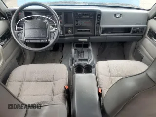 1996 Jeep Cherokee Sport with VIN 1J4FJ68S3TL251074, listed as a Copart auction lot 59593955 with 181,482 mi miles and Salvage title. Bid and sale history available at DreamBid. Image 8.