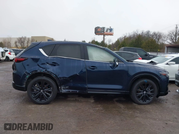 2022 Mazda CX-5 2.5 Turbo with VIN JM3KFBAY8N0635618, listed as a IAAI auction lot 41199038 with Not Provided miles and . Bid and sale history available at carsss.com. Image 13.