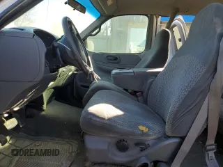 1999 Ford F-150 XL с VIN 1FTRX08L3XKB18916, выставлен на аукционе Copart как лот 81892064 с пробегом 175 280 миль миль и Списание • Salvage title. История ставок и продаж доступна на DreamBid. Изображение 7.