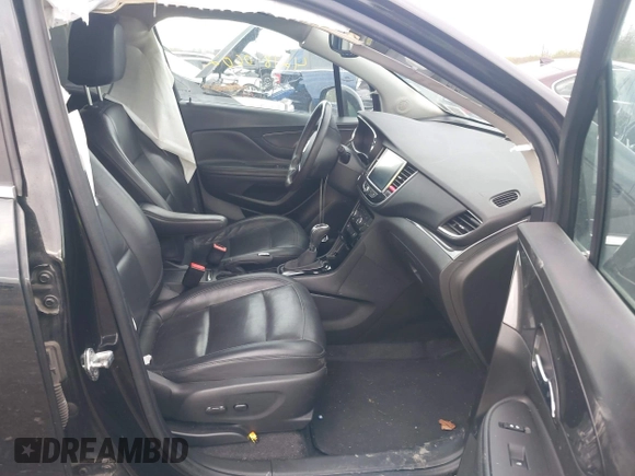 2017 Buick Encore Essence with VIN KL4CJCSB5HB112457, listed as a IAAI auction lot 42180602 with 125,238 mi miles and . Bid and sale history available at carsss.com. Image 5.