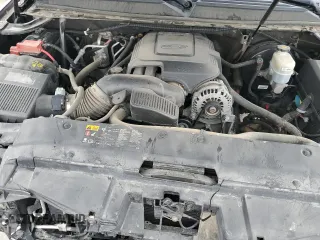 2011 Chevrolet Suburban LT with VIN 1GNSKJE36BR333157, listed as a Copart auction lot 50196875 with 147,448 mi miles and Salvage Title. Bid and sale history available at carsss.com. Image 13.