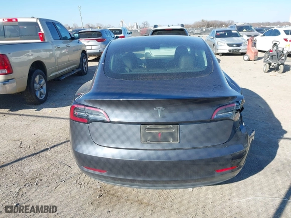 2023 Tesla Model 3 with VIN 5YJ3E1EA3PF678825, listed as a IAAI auction lot 41283153 with 8,607 mi miles. Bid and sale history available at carsss.com. Image 16.