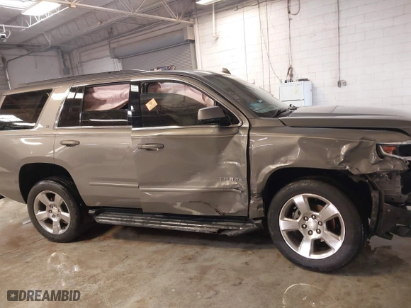 2017 Chevrolet Tahoe LT with VIN 1GNSCBKC8HR397846, listed as a IAAI auction lot 41549432 with 96,952 mi miles. Bid and sale history available at carsss.com. Image 14.