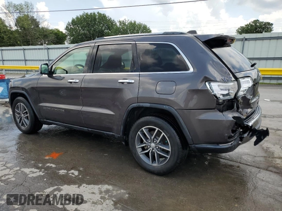 2018 Jeep Grand Cherokee Limited with VIN 1C4RJEBG1JC300335, listed as a Copart auction lot 61853325 with 107,137 mi miles and Salvage title. Bid and sale history available at DreamBid. Image 2.
