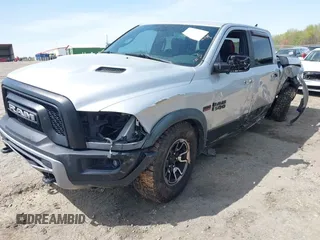 2015 Ram 1500 Rebel z VIN 1C6RR7YT0FS751334, wystawiony jako IAAI lot #41933040 z przebiegiem 167 336 mil mil oraz . Historia ofert i sprzedaży dostępna na DreamBid. Obrazek 2.