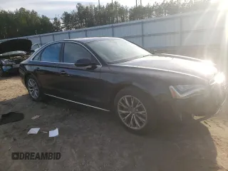 2012 Audi A8 с VIN WAUAVAFD3CN008149, выставлен на аукционе Copart как лот 44489925 с пробегом 125 086 миль миль и Списание • Salvage title. История ставок и продаж доступна на DreamBid. Изображение 4.