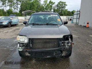 2006 Ford Escape XLS with VIN 1FMYU02Z66KA18952, listed as a Copart auction lot 60472305 with 221,258 mi miles and Salvage title. Bid and sale history available at DreamBid. Image 5.