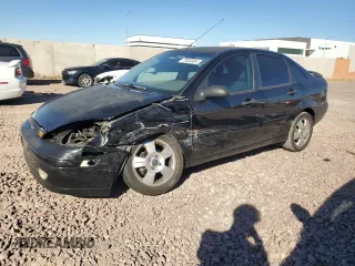 2003 Ford Focus ZTS with VIN 1FAFP38333W249101, listed as a Copart auction lot 77824534 with 163,513 mi miles and Salvage Title. Bid and sale history available at carsss.com. Image 1.