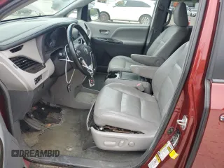2015 Toyota Sienna XLE with VIN 5TDYK3DC1FS648469, listed as a Copart auction lot 57471975 with 118,567 mi miles and Non repairable. Bid and sale history available at DreamBid. Image 7.