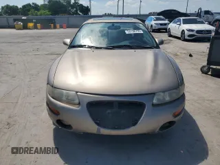 1999 Chrysler Sebring LXi with VIN 4C3AU52N1XE071836, listed as a Copart auction lot 54136735 with 151,531 mi miles and Salvage Title. Bid and sale history available at DreamBid. Image 5.