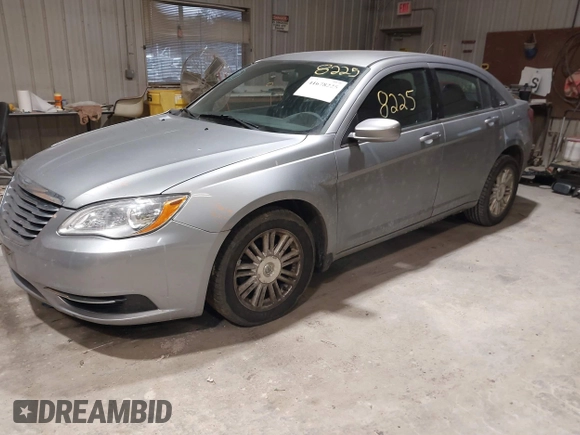 2013 Chrysler 200 LX with VIN 1C3CCBAG0DN737577, listed as a IAAI auction lot 41678225 with 165,186 mi miles. Bid and sale history available at carsss.com. Image 2.