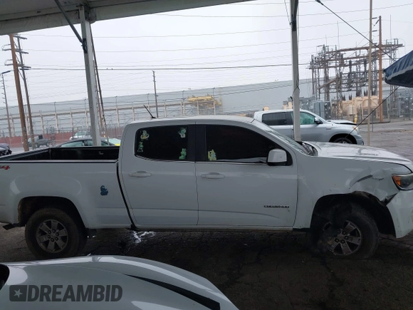 2019 Chevrolet Colorado 4WD Work Truck with VIN 1GCGTBEN8K1347983, listed as a IAAI auction lot 41923067 with 111,827 mi miles and . Bid and sale history available at DreamBid. Image 14.