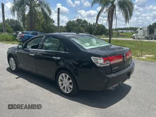 2011 Lincoln MKZ Hybrid z VIN 3LNDL2L33BR759329, wystawiony jako Copart lot #60902525 z przebiegiem 131 927 mil mil oraz Czysty tytuł • Clean title. Historia ofert i sprzedaży dostępna na DreamBid. Obrazek 3.