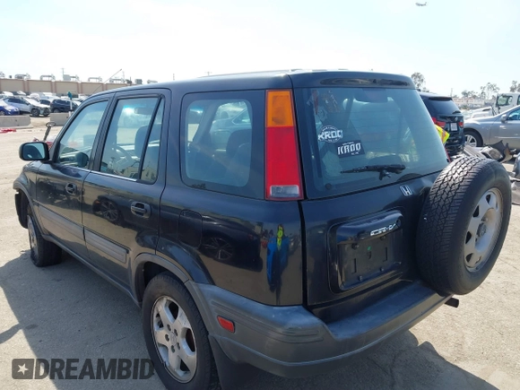 1999 Honda CR-V LX with VIN JHLRD2844XC011920, listed as a IAAI auction lot 41820203 with 224,967 mi miles. Bid and sale history available at carsss.com. Image 3.