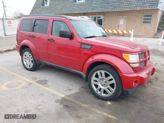 2011 Dodge Nitro Heat with VIN 1D4PT4GK0BW576274, listed as a IAAI auction lot 40950507 with 220,030 mi miles. Bid and sale history available at carsss.com. Image 1.