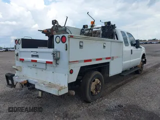 2014 Ford F-350 with VIN 1FT7X3B61EEA23424, listed as a IAAI auction lot 42034586 with 205,394 mi miles and . Bid and sale history available at DreamBid. Image 4.