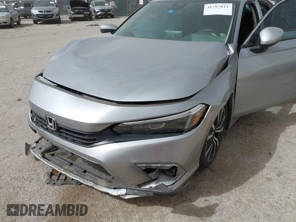 2023 Honda Civic EX with VIN 2HGFE1F77PH321210, listed as a IAAI auction lot 41797011 with 8,748 mi miles and . Bid and sale history available at DreamBid. Image 6.