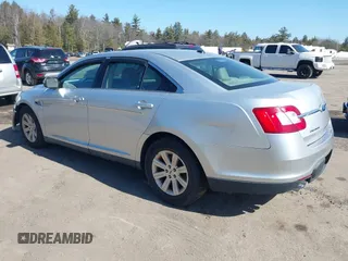2011 Ford Taurus SE with VIN 1FAHP2DW9BG150326, listed as a IAAI auction lot 41783115 with 171,421 mi miles. Bid and sale history available at carsss.com. Image 3.