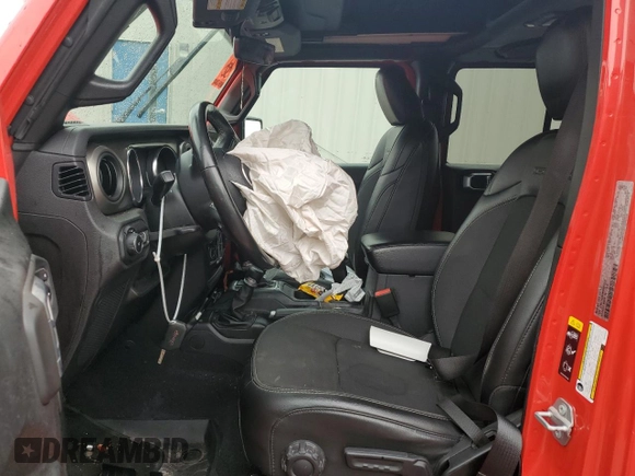2021 Jeep Wrangler Unlimited Freedom with VIN 1C4HJXDN0MW605573, listed as a Copart auction lot 59896165 with 55,751 mi miles and Salvage title. Bid and sale history available at DreamBid. Image 7.
