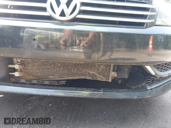 2014 Volkswagen Passat Wolfsburg Edition with VIN 1VWAT7A35EC056127, listed as a IAAI auction lot 42497467 with 111,443 mi miles and . Bid and sale history available at DreamBid. Image 6.