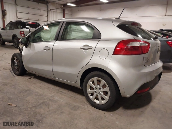 2013 Kia Rio LX with VIN KNADM5A31D6274318, listed as a IAAI auction lot 40986091 with 182,000 mi miles. Bid and sale history available at carsss.com. Image 3.